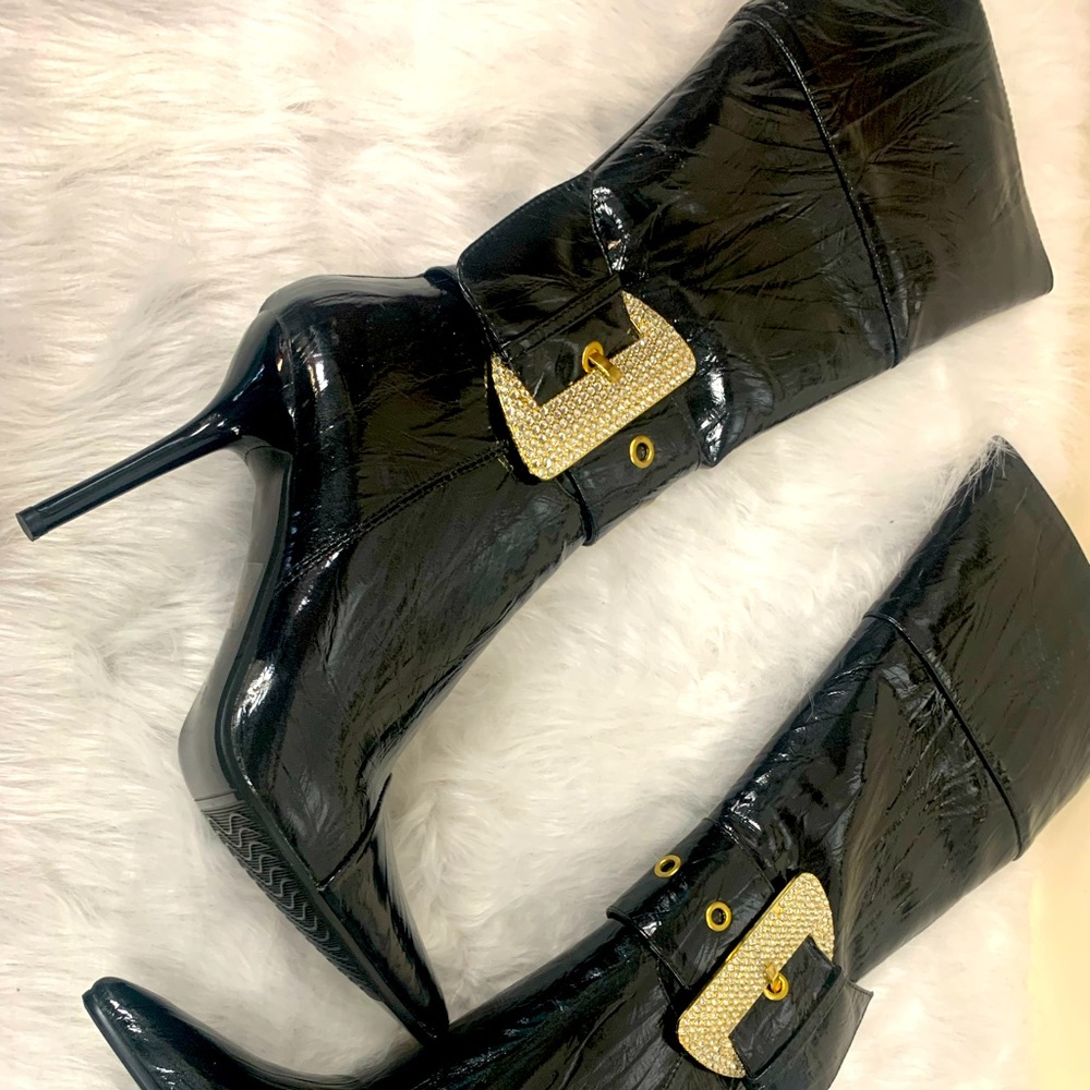 Black knee high boots with rhinestone buckle